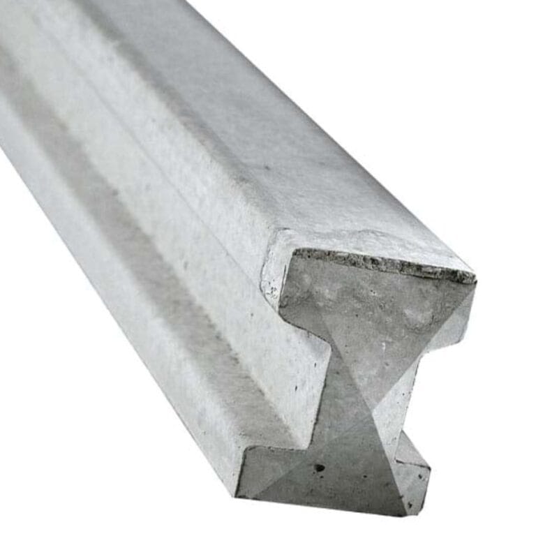 A closeup of a concrete slotted fence post