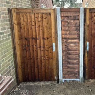 An image showing an installed closeboard gate with fittings